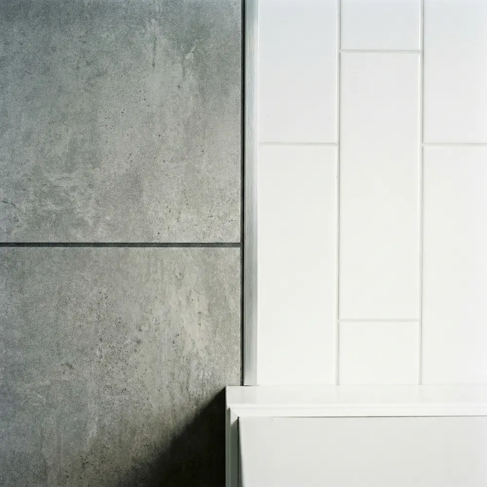 Close-up of premium tile transition in ADU